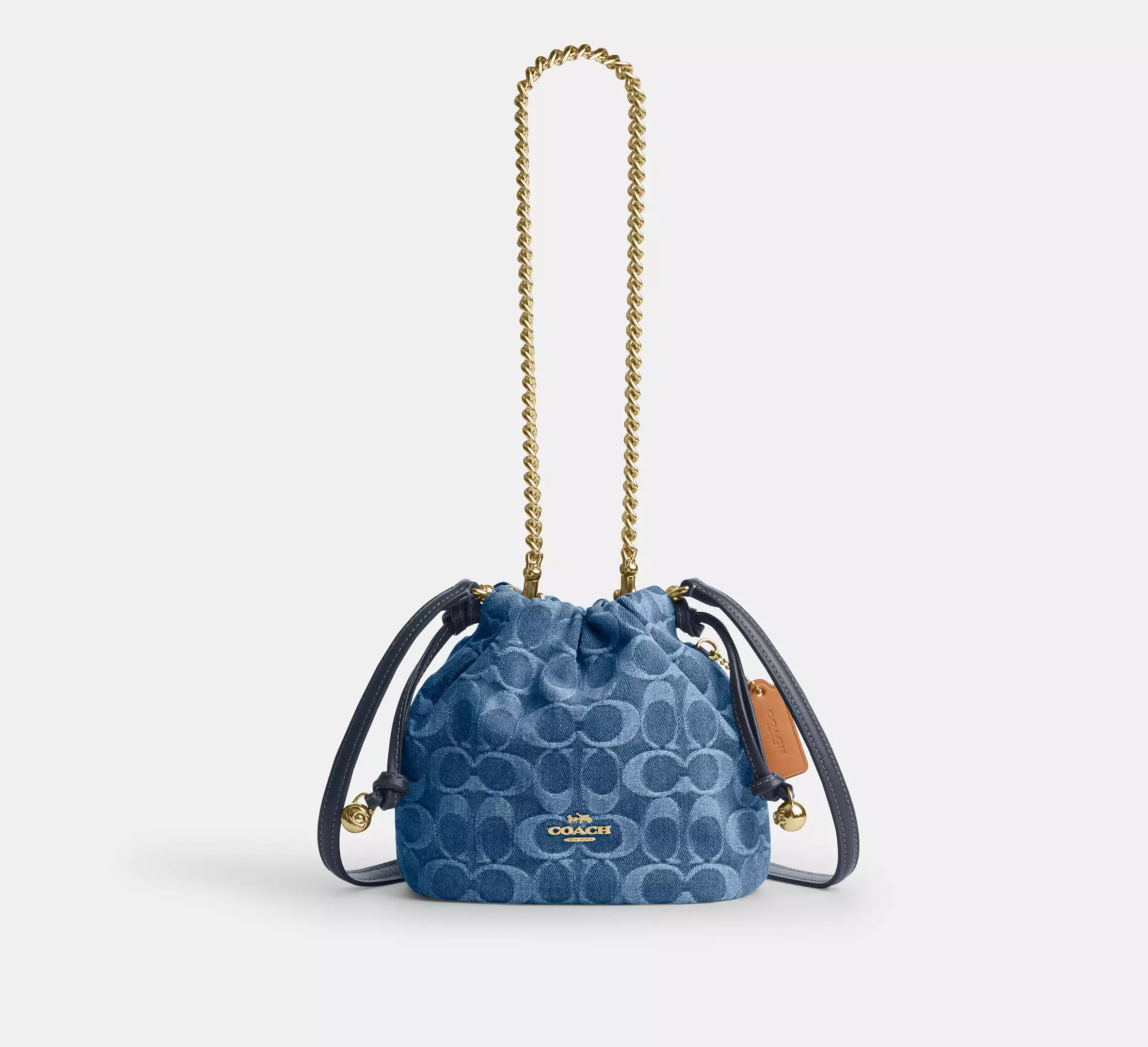 Faye Mini Drawstring Bag In Signature Denim