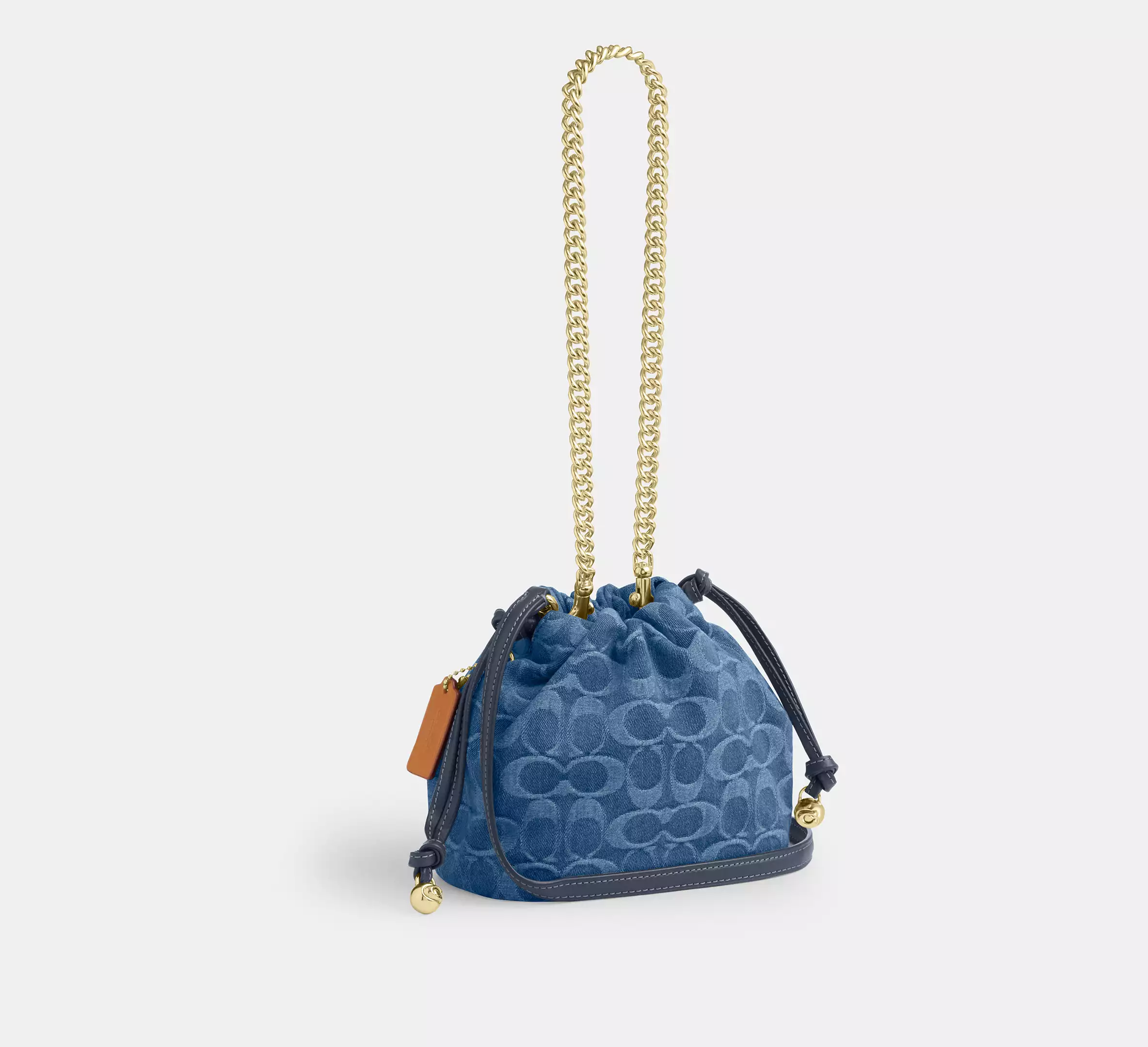 Faye Mini Drawstring Bag In Signature Denim