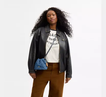 Faye Mini Drawstring Bag In Signature Denim