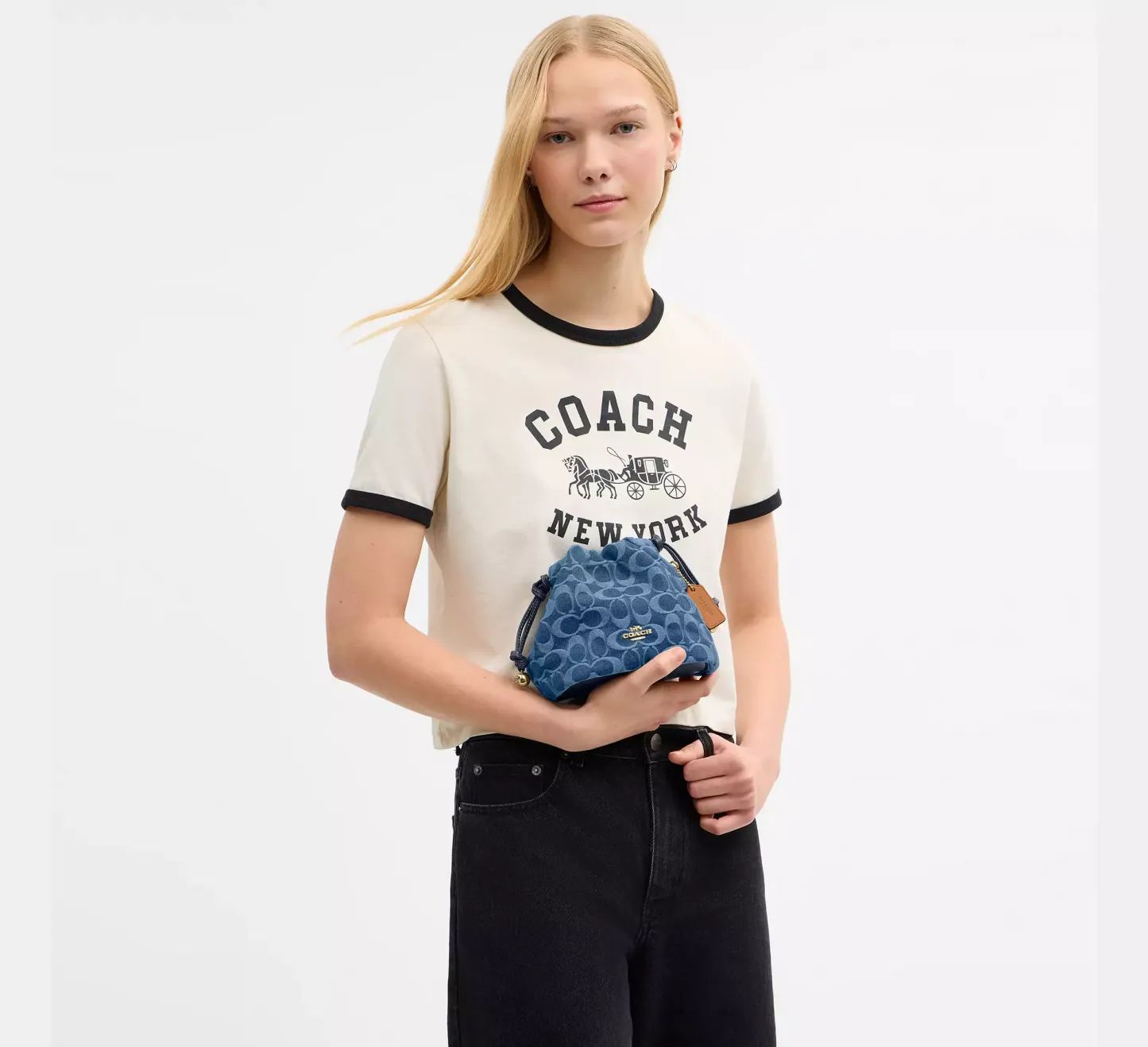 Faye Mini Drawstring Bag In Signature Denim