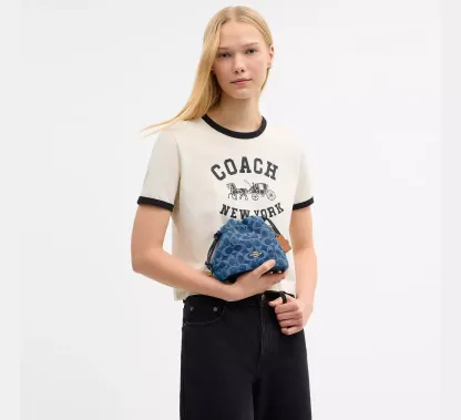 Faye Mini Drawstring Bag In Signature Denim