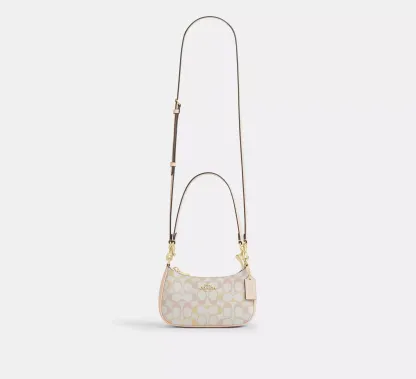 Teri Mini Crossbody Bag In Signature Canvas