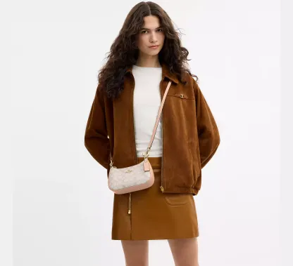 Teri Mini Crossbody Bag In Signature Canvas
