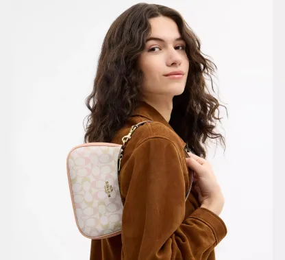 Teri Mini Crossbody Bag In Signature Canvas