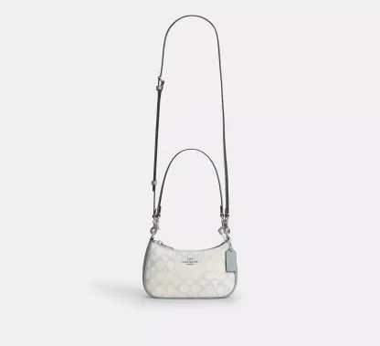 Teri Mini Crossbody Bag In Signature Canvas