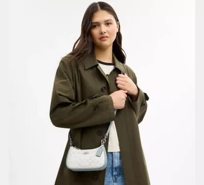 Teri Mini Crossbody Bag In Signature Canvas