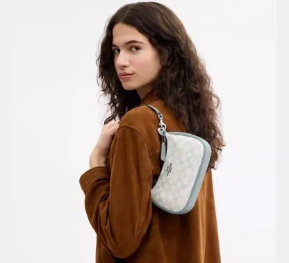 Teri Mini Crossbody Bag In Signature Canvas