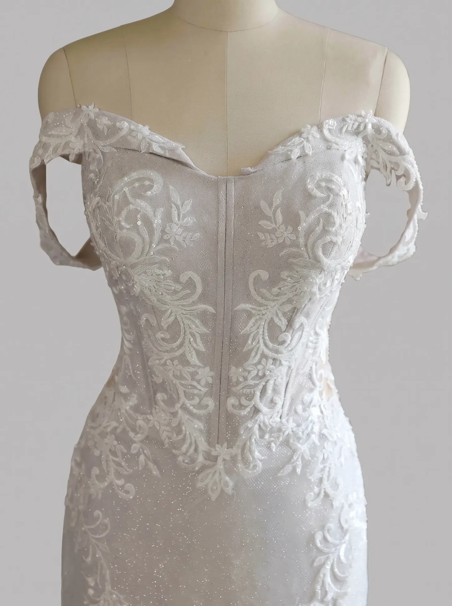 Couture Lee Off-the-Shoulder Sequin Lace Fit-and-Flare Wedding Gown With Lotus Train
