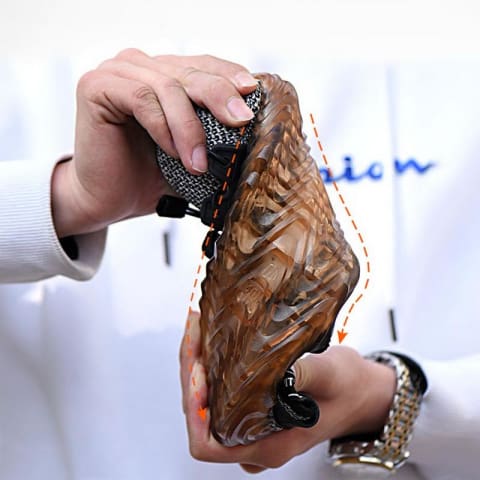 Person holding sole demonstrating its flexibility 480 x 480