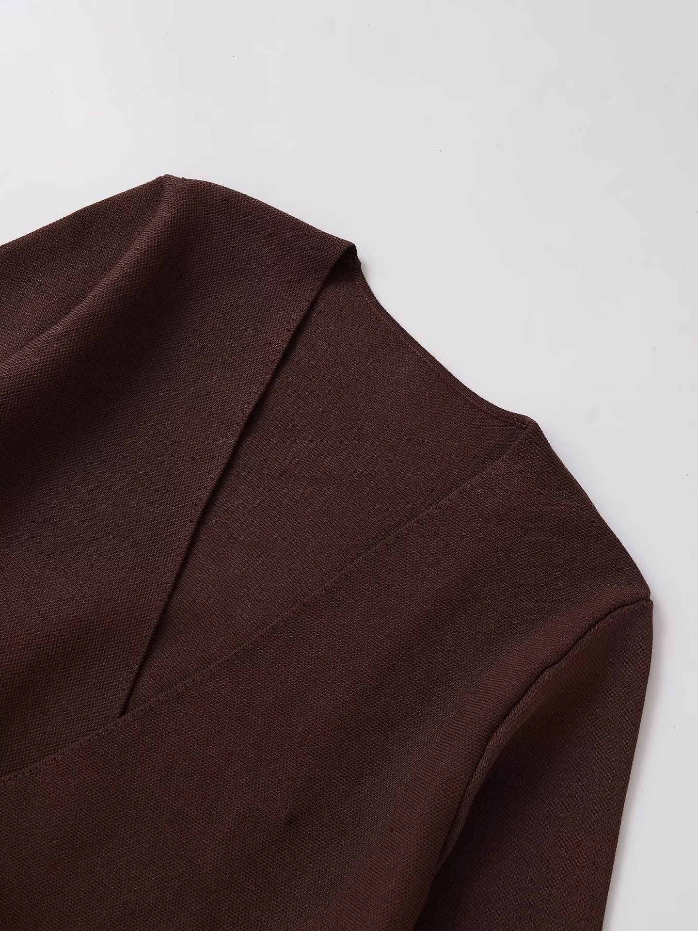 Stylish V-neck knit top with belted cardigan