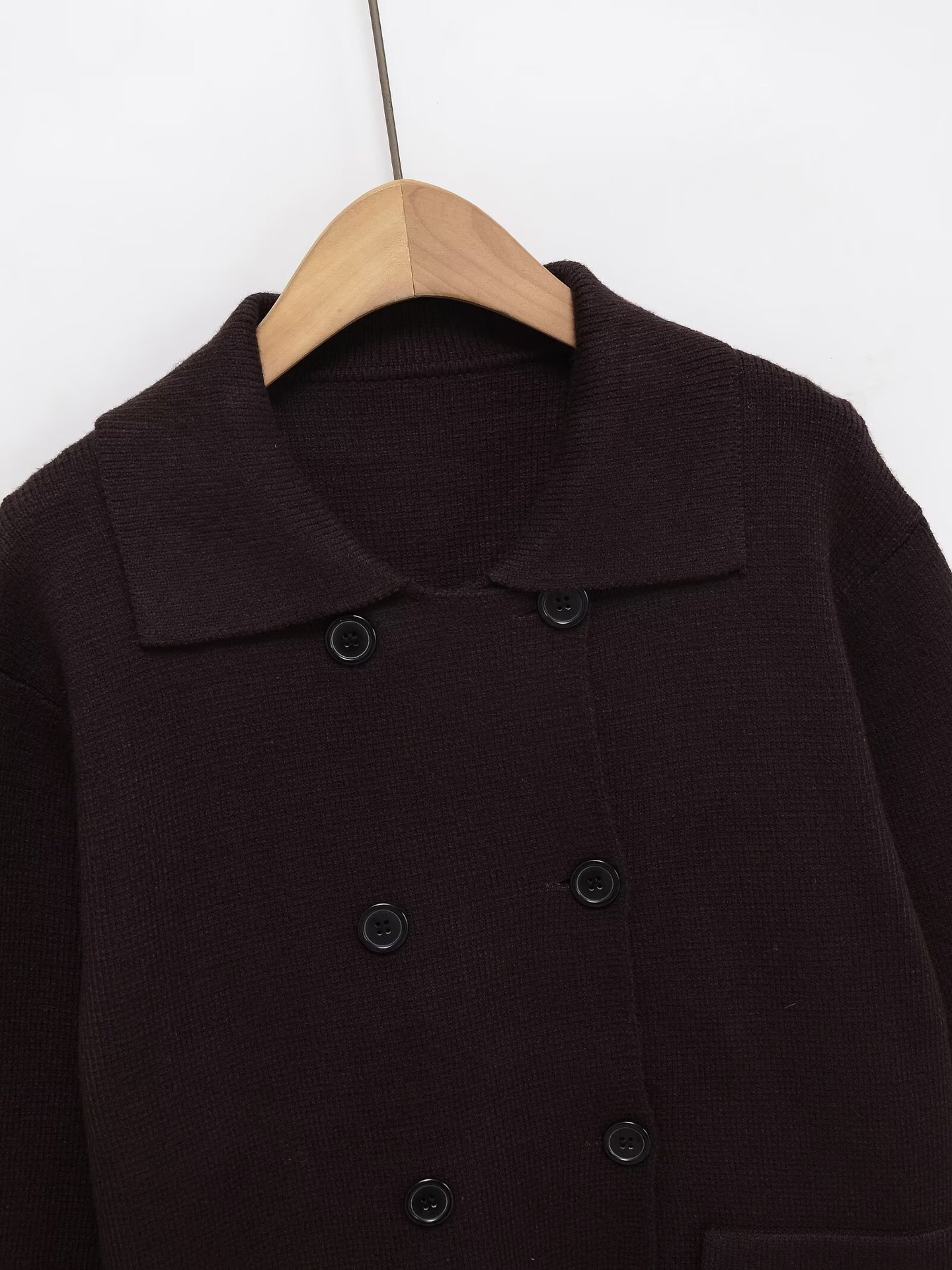 Double-breasted knitted jumper