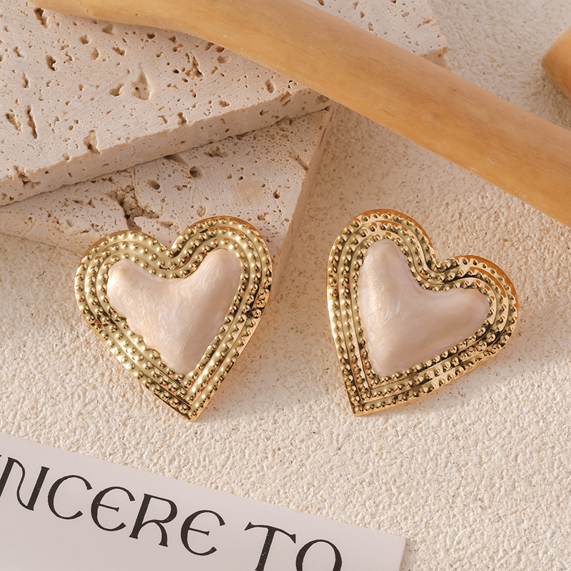 Stylish Metallic Peach Heart Earrings-consonak