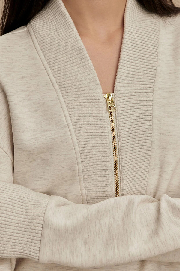 Meet The Autumn Ribbed Zipper Neck Sweatshirt and Elastic Waist Pocketed Loose Pants Set | Consonak
