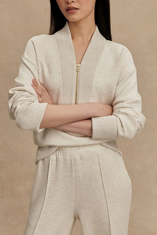 Meet The Autumn Ribbed Zipper Neck Sweatshirt and Elastic Waist Pocketed Loose Pants Set | Consonak