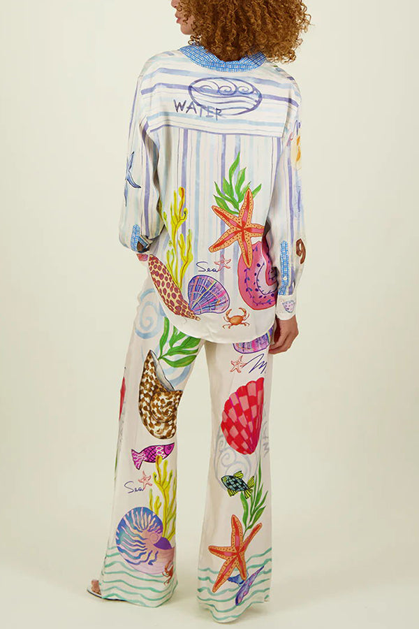 Dream Ocean Satin Unique Print Back Elastic Waist Pocketed Wide Leg Pants | Consonak