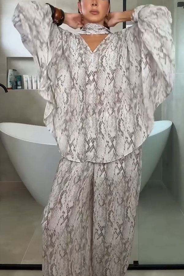 Gerrie Animal Print Batwing Sleeve Tie-up Shirt and Elastic Waist Pocket Loose Bloomers Pants Set