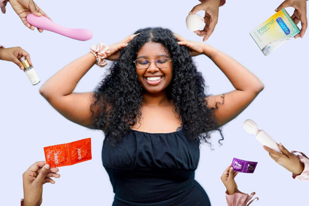 Sex coach Amari surrounded by sexual wellness products, representing body confidence, pelvic health, and empowered intimacy at any age. How does the Kegel8 Ultra 20 support sexual wellness?