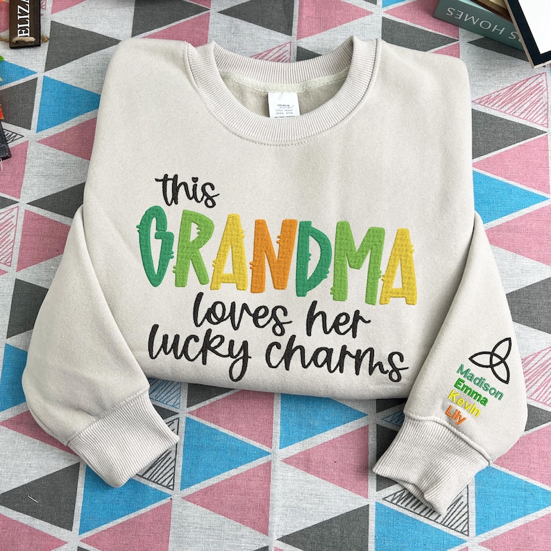 Custom This Grandma Wears Her Heart On Her Sleeve Embroidered Sweatshirt Names On Sleeve