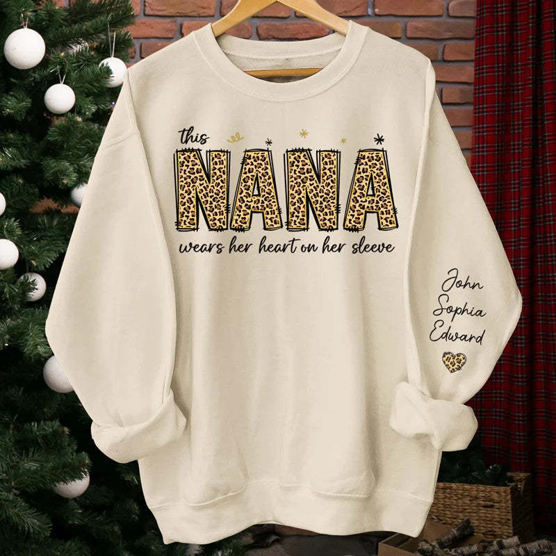 This Nana Wears Her Heart On Her Sleeve - Family Personalized Unisex Sweatshirt With Design On Sleeve - Birthday Gift For Mom, Grandma