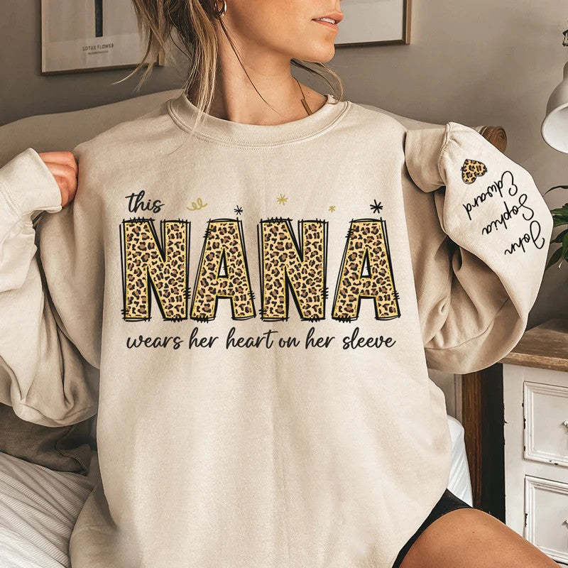This Nana Wears Her Heart On Her Sleeve - Family Personalized Unisex Sweatshirt With Design On Sleeve - Birthday Gift For Mom, Grandma