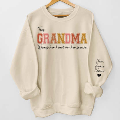 Mommy‘s Heart Belongs To - Family Personalized Custom Unisex Sweatshirt With Design On Sleeve