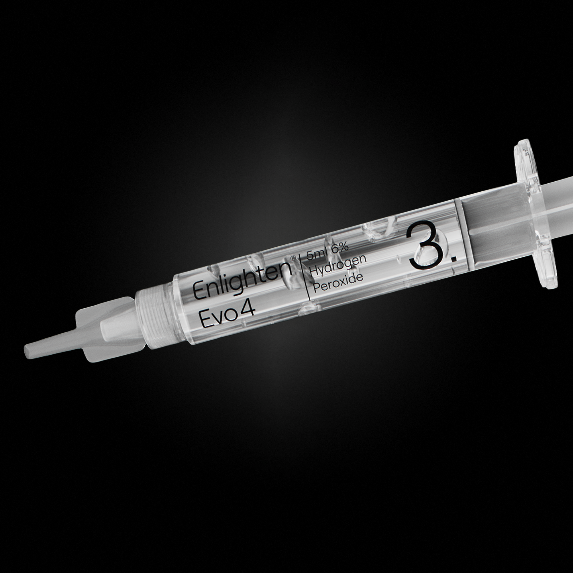 A close-up of the Enlighten Evo4 syringe labelled "3," containing 5ml of 6% hydrogen peroxide whitening gel. The transparent syringe is set against a sleek black background, emphasising its precision design and premium quality.