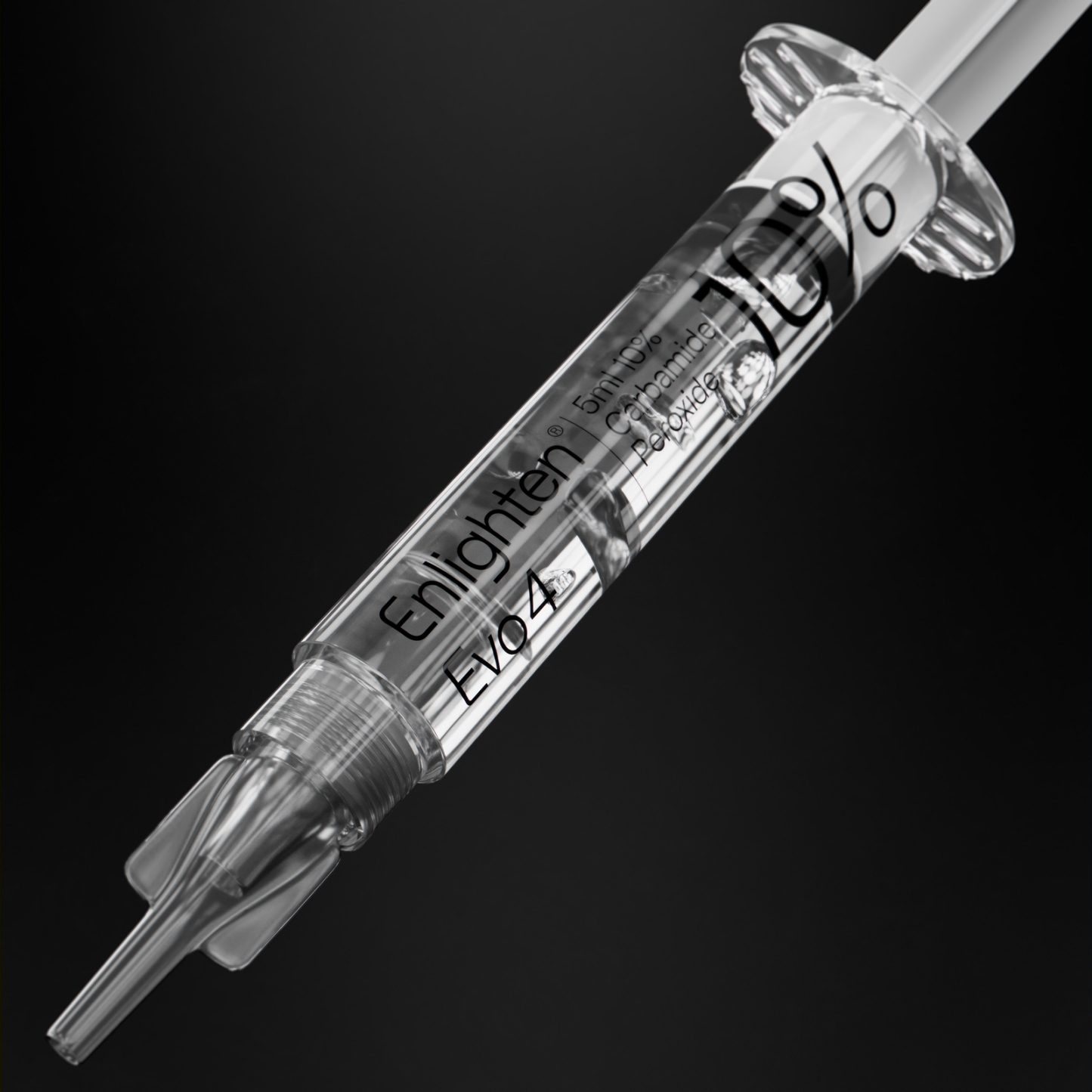 A close-up of the Enlighten Evo4 syringe containing 5ml of 10% carbamide peroxide whitening gel. The transparent syringe showcases its precision design, clear labelling, and professional branding. Set against a dark black background, the image highlights the product's premium quality and advanced whitening formulation.