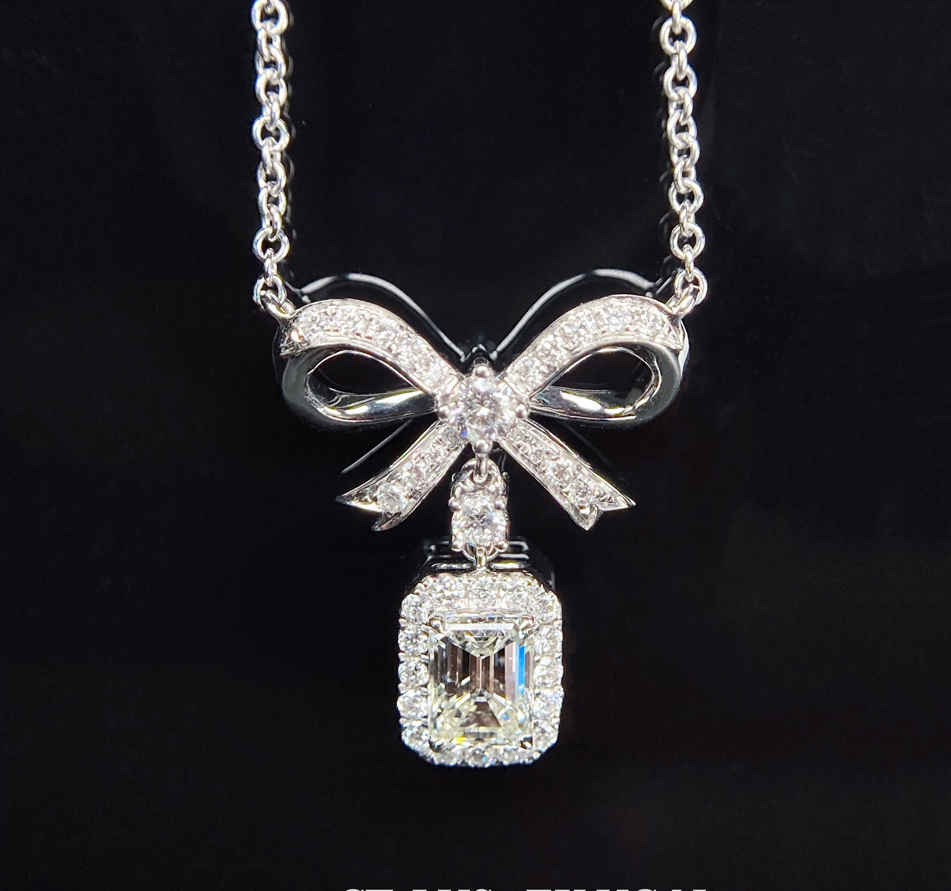 1ct Emerald diamond necklace.