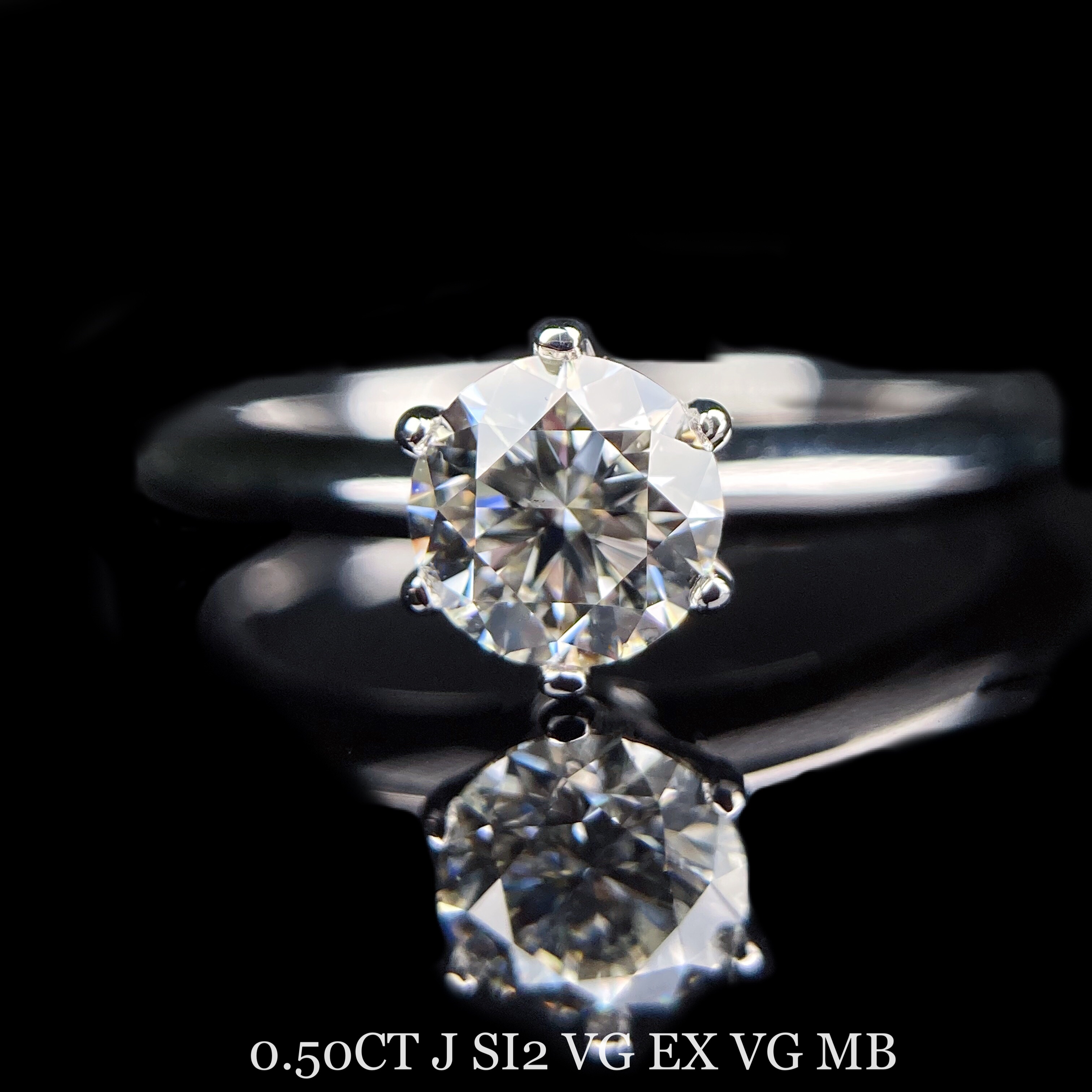 classical 0.5ct round diamond ring