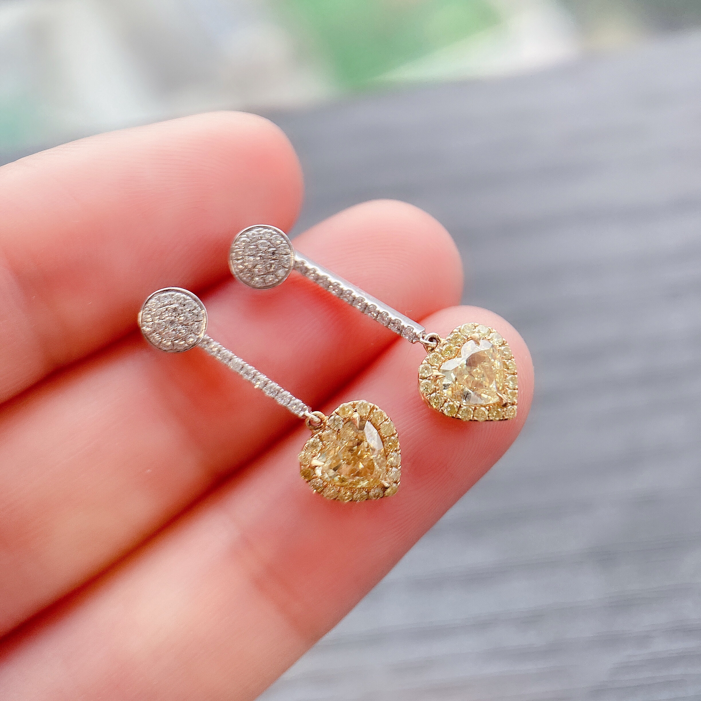 1ct heart yellow diamond earring.