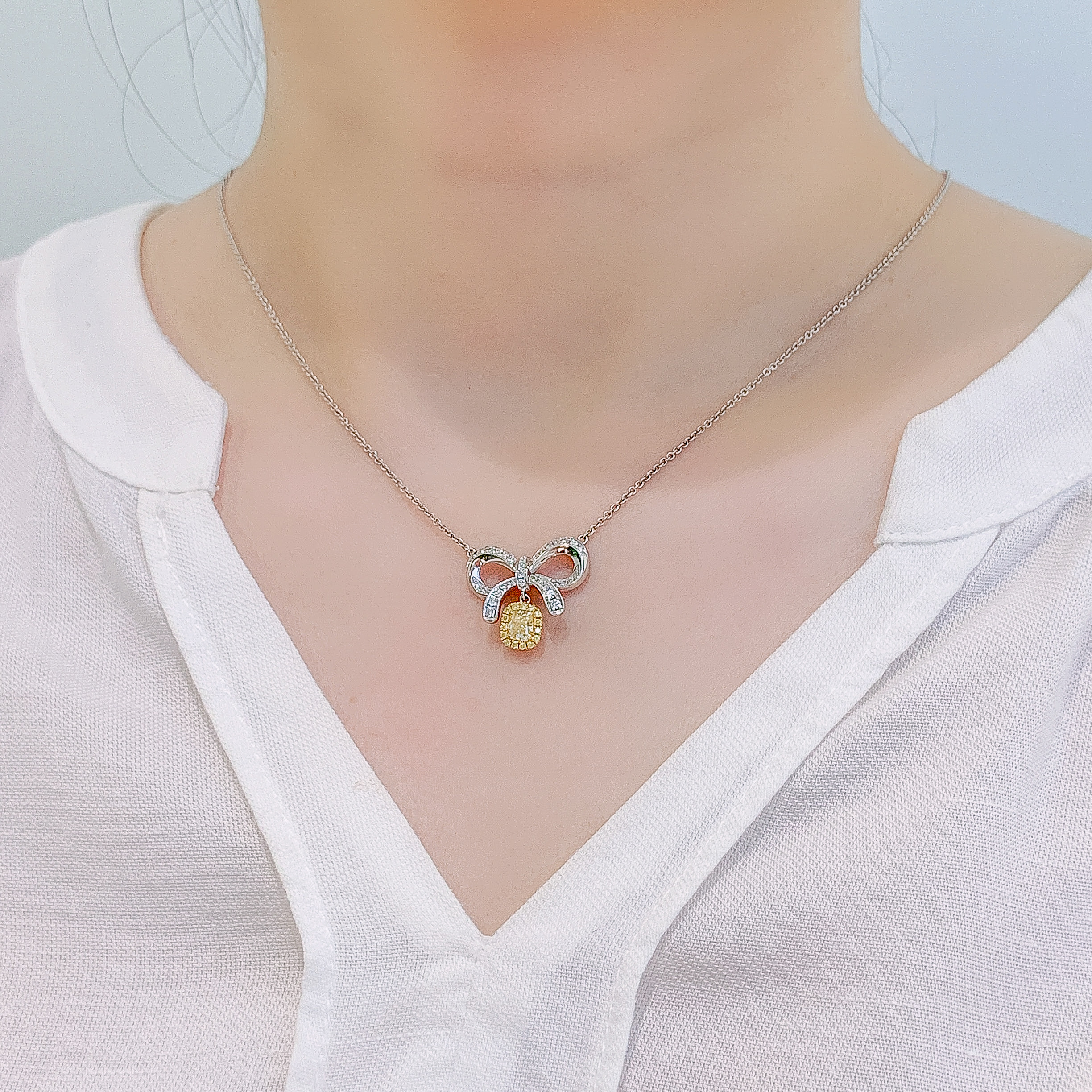 0.5ct yellow diamond delicate bow necklace