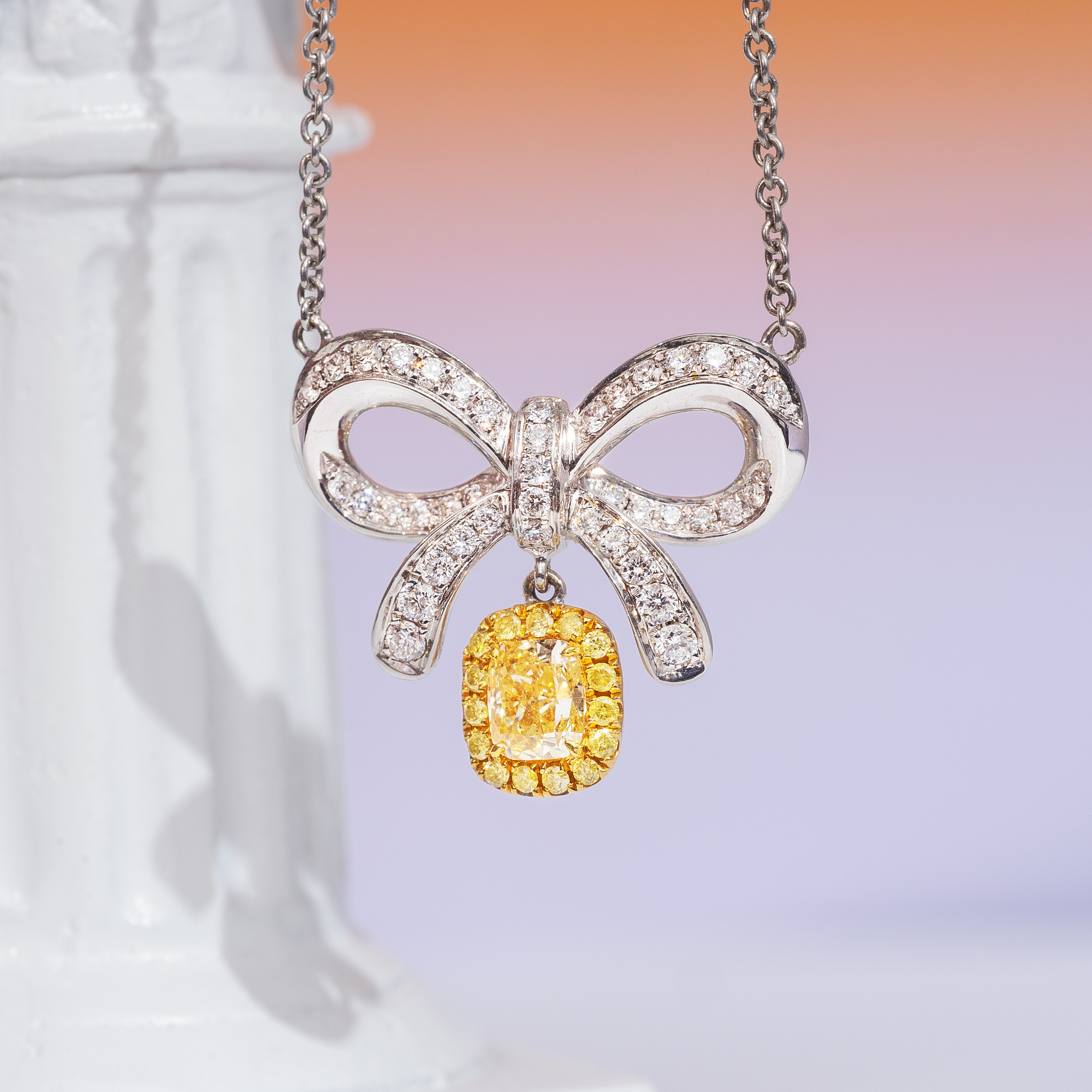 0.5ct yellow diamond delicate bow necklace