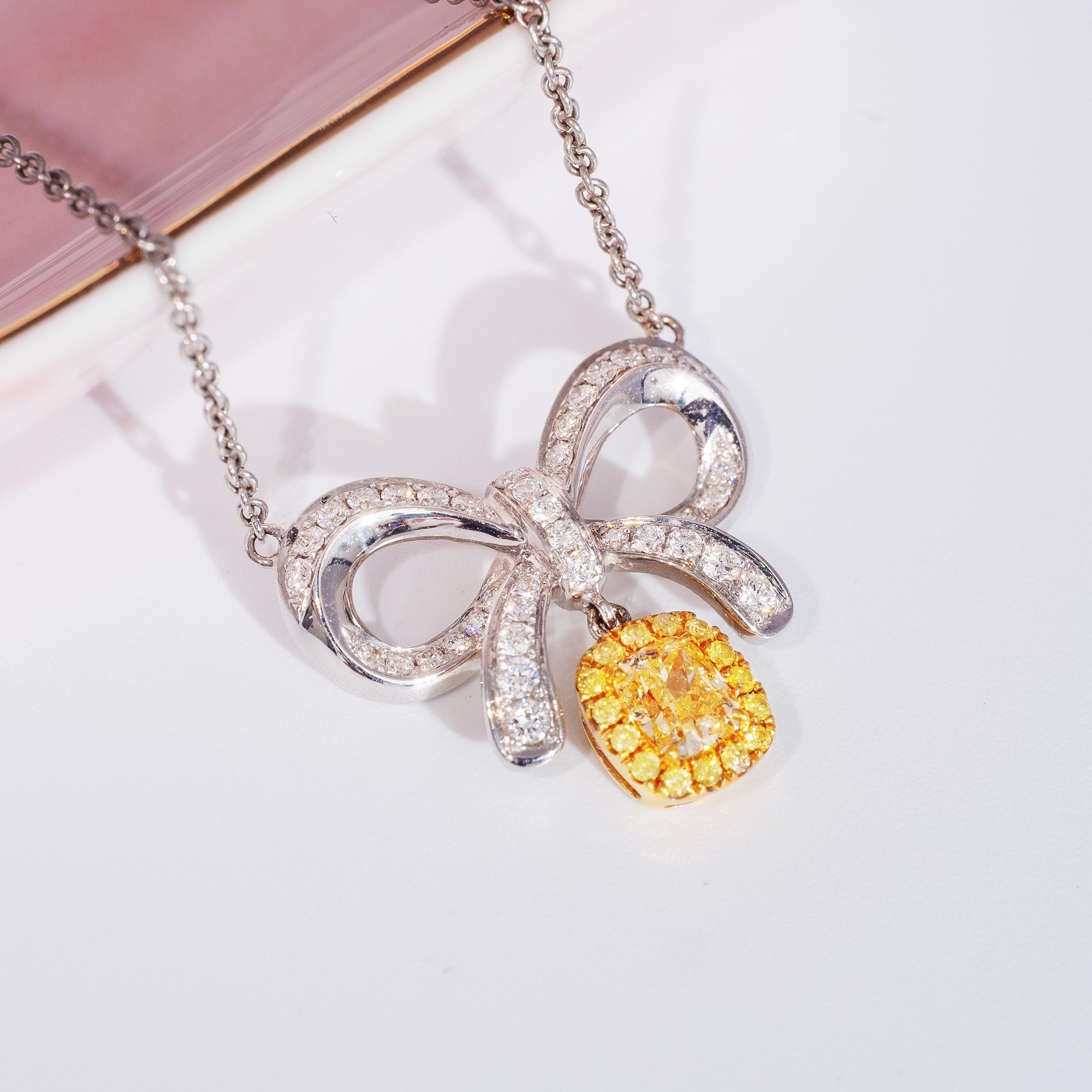 0.5ct yellow diamond delicate bow necklace