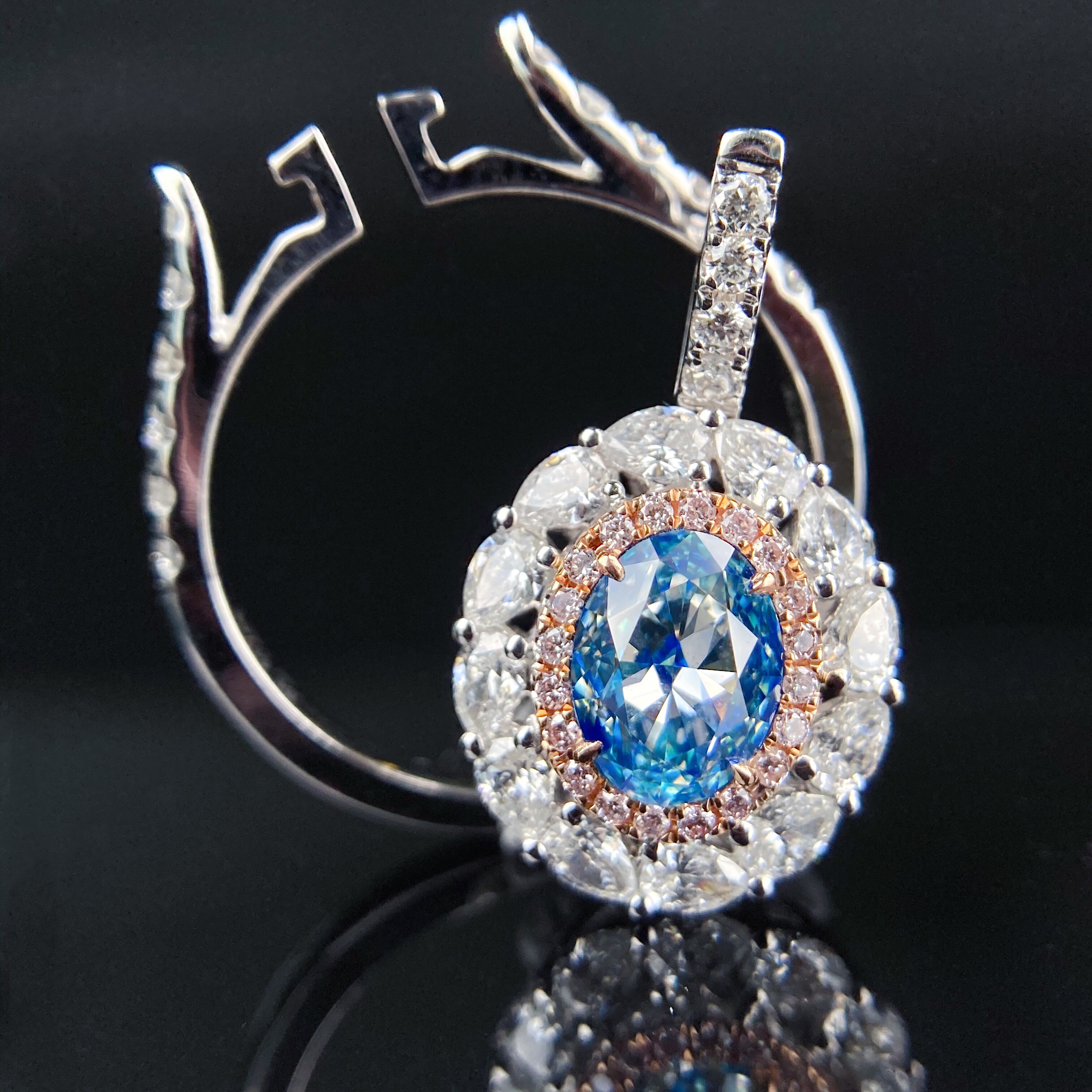 1ct oval blue diamond ring & pendant.
