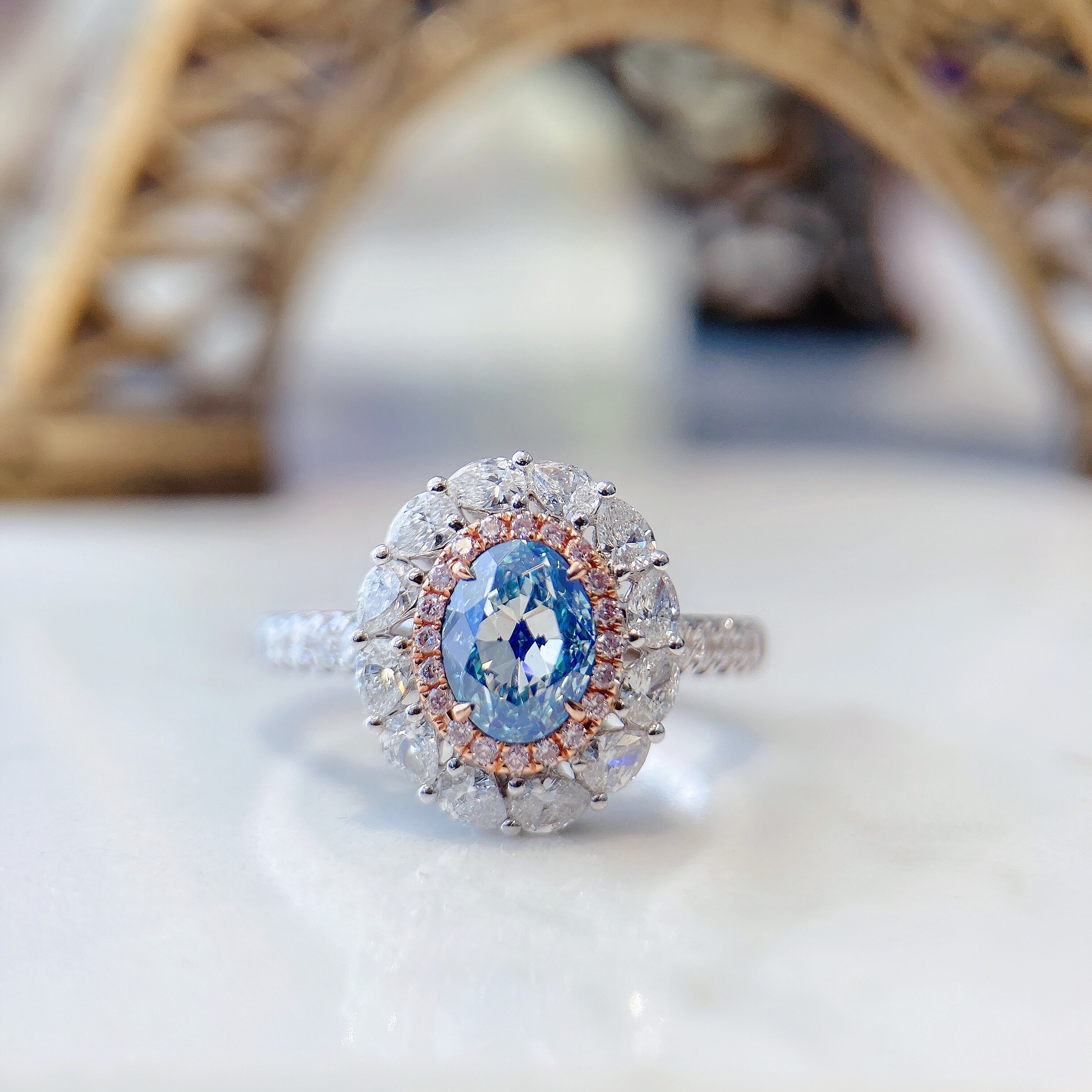 1ct oval blue diamond ring & pendant.