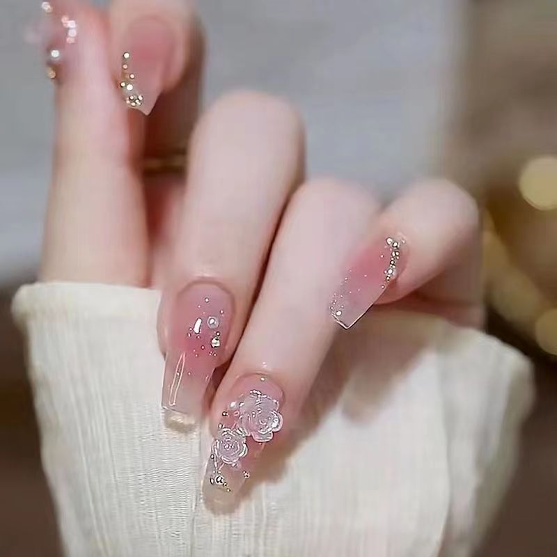 Medium and long wear nail three-dimensional raised camellia pearl wear nail wholesale finished product reuse nail art