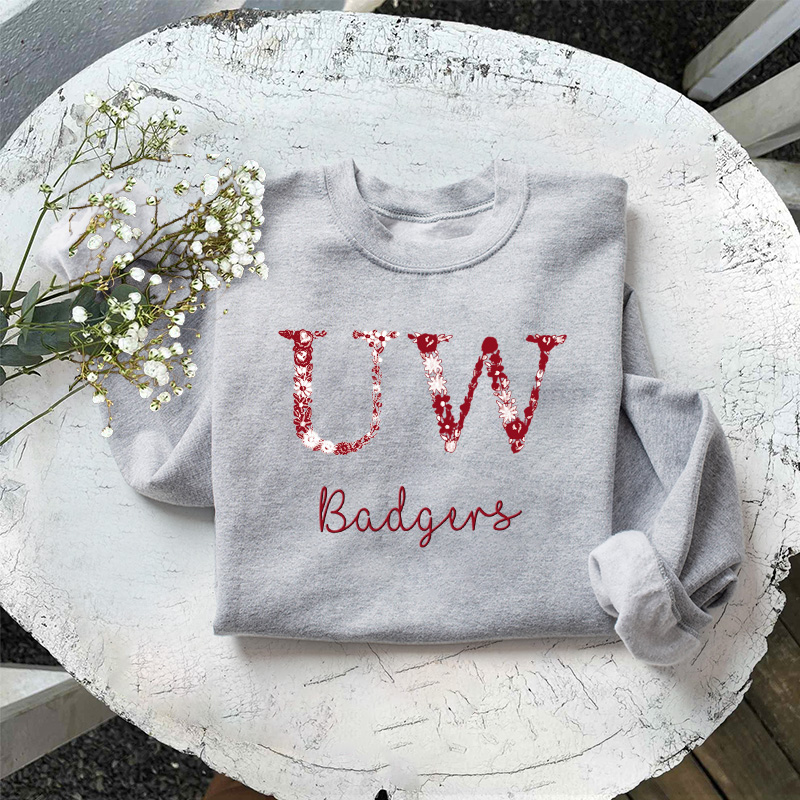 Customized Wisconsin Badgers Football Sweatshirts With Trendy Floral Embroidery