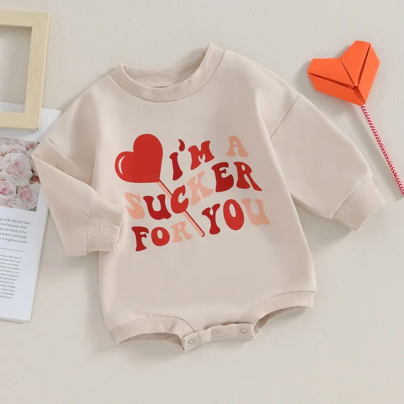 Baby I鈥榤 Sucker For You Romper