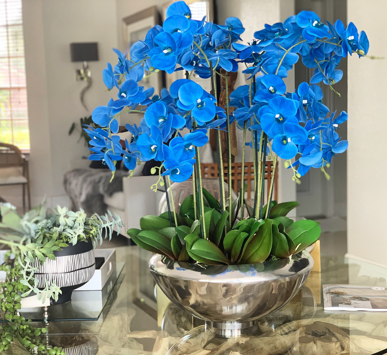 Avenue bowl with blue Phalaenopsis orchids 