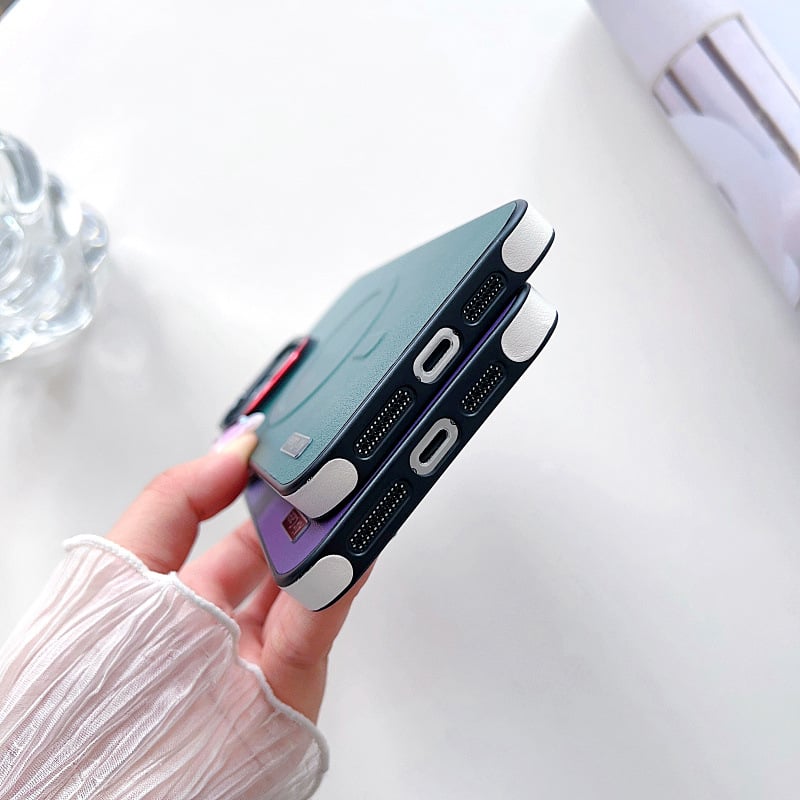 Crash-proof Phone case with color-pigmented leather and metal buttons.