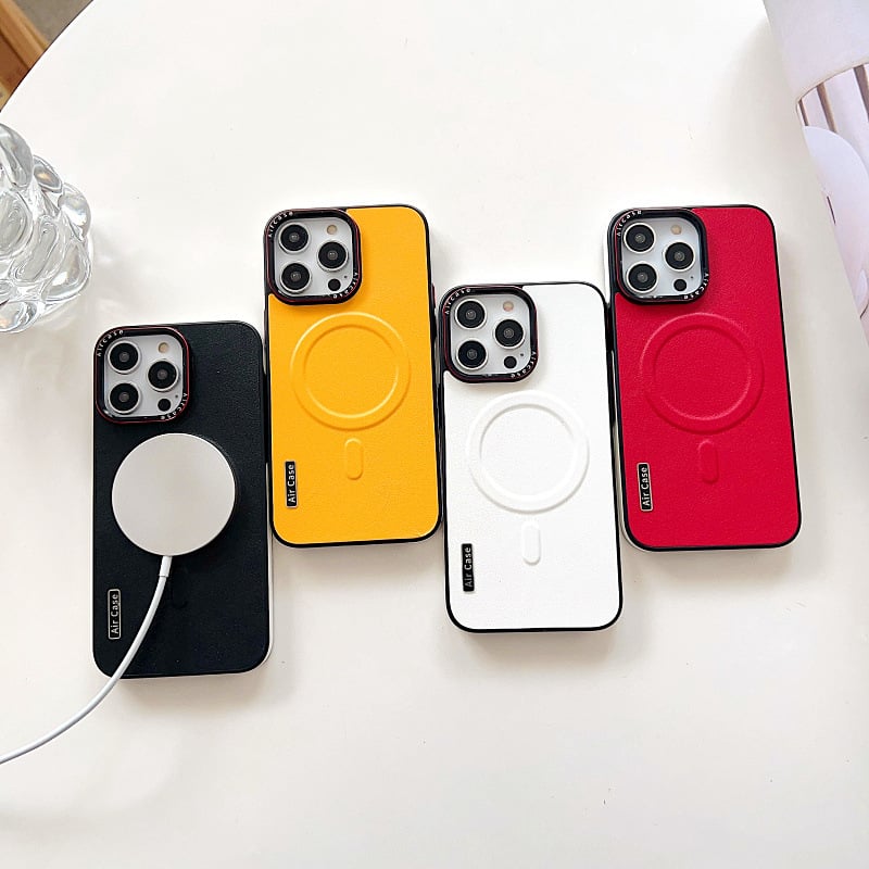 Crash-proof Phone case with color-pigmented leather and metal buttons.