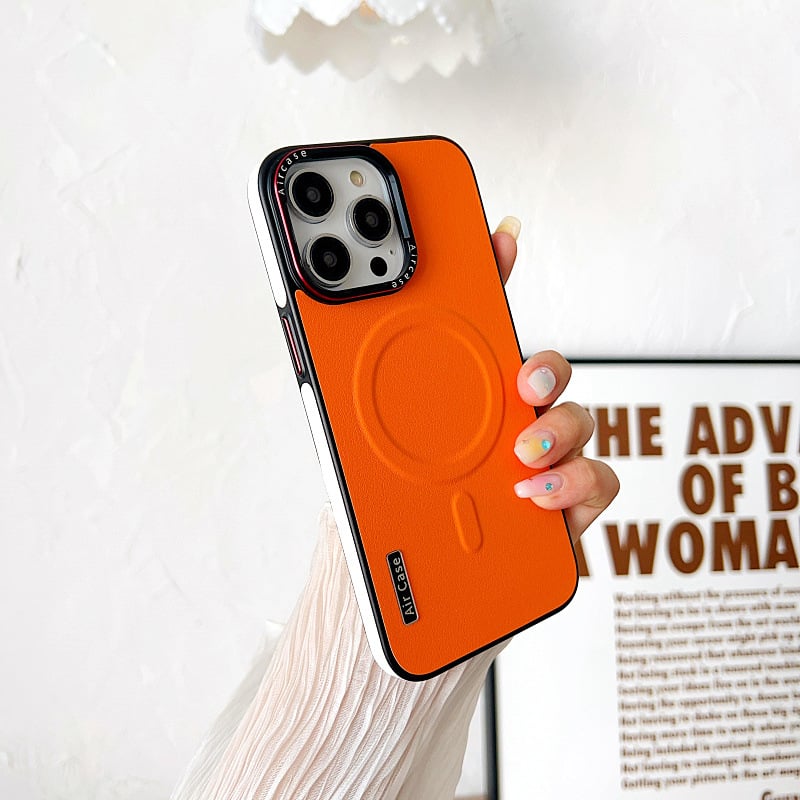Crash-proof Phone case with color-pigmented leather and metal buttons.