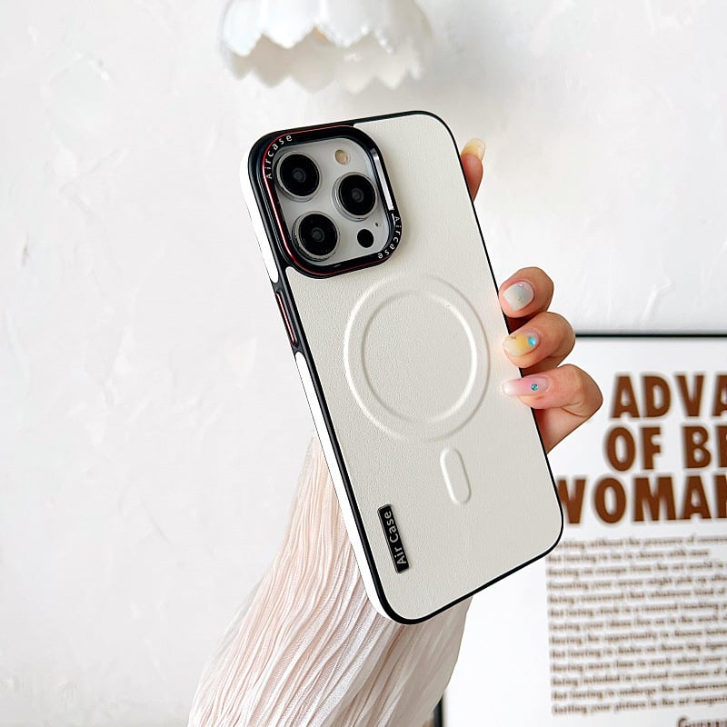 Crash-proof Phone case with color-pigmented leather and metal buttons.