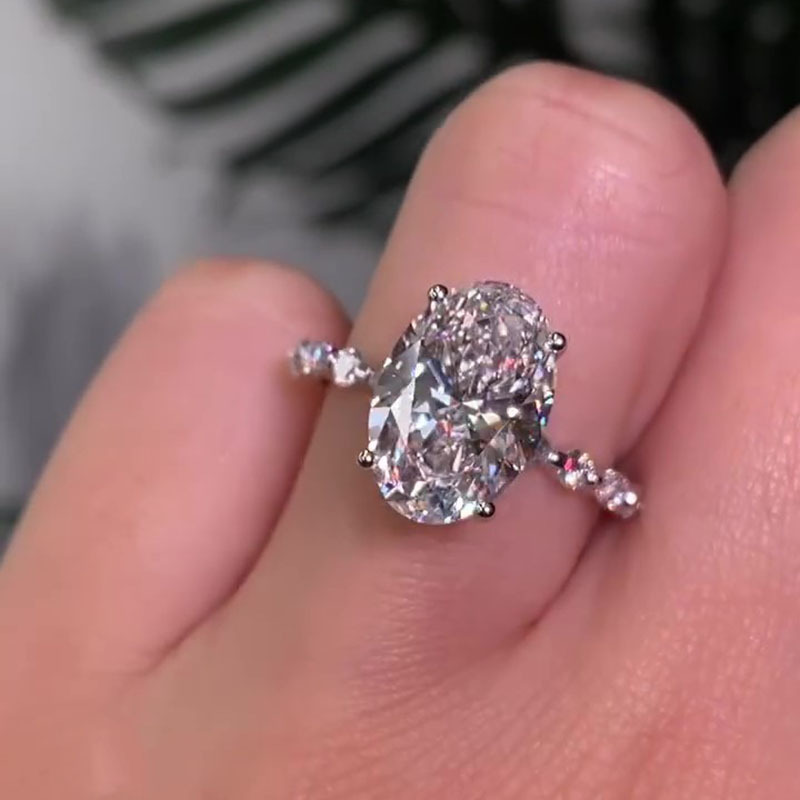 Maxine Unique Oval Cut Engagement Ring In Sterling Silver