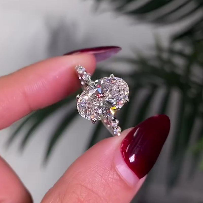 Maxine Unique Oval Cut Engagement Ring In Sterling Silver