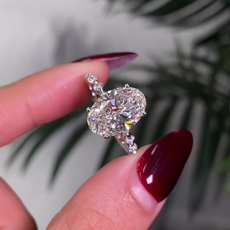 Maxine Unique Oval Cut Engagement Ring In Sterling Silver