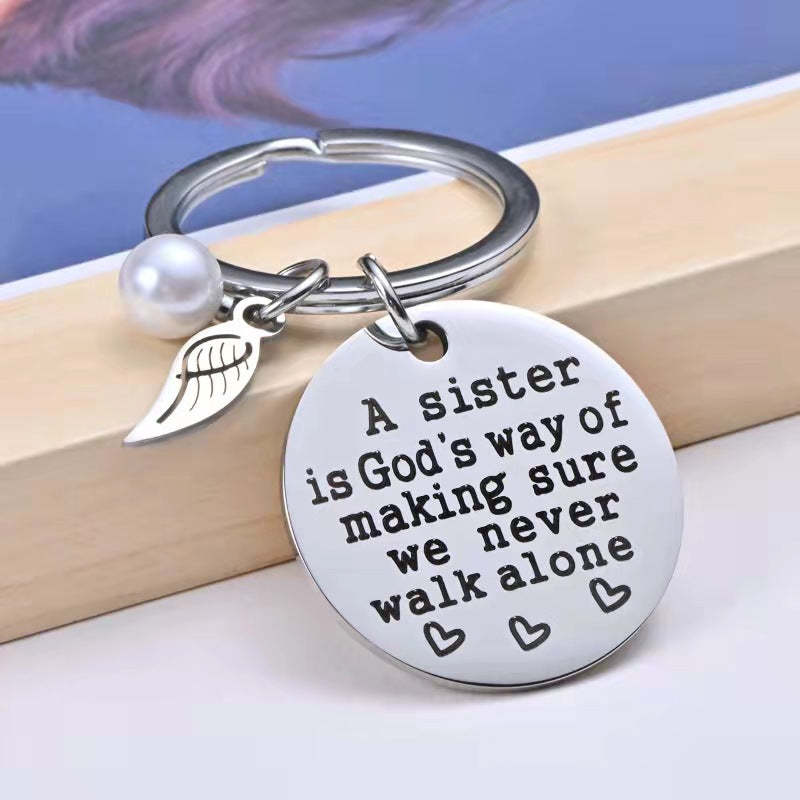 A Sister is God's Way of Making Sure We Never Walk Alone Keychain Keychain GrindStyle