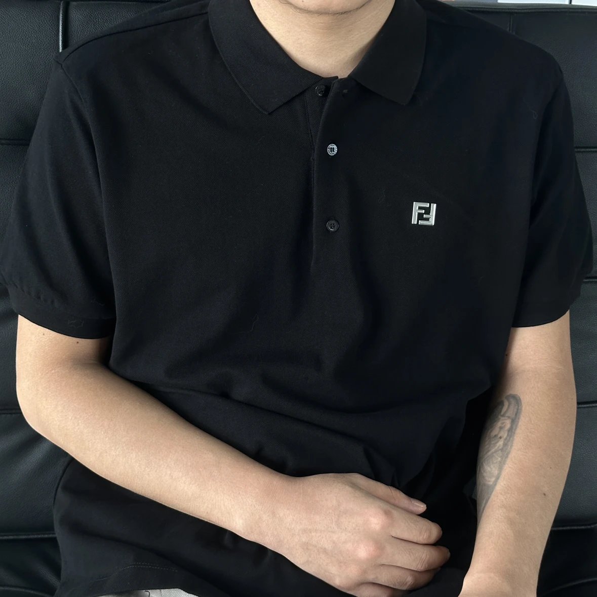 Item ID 8310 FEND1 Fendi -“ Frame craftsmanship ” Metal FF Buttoned embossed short