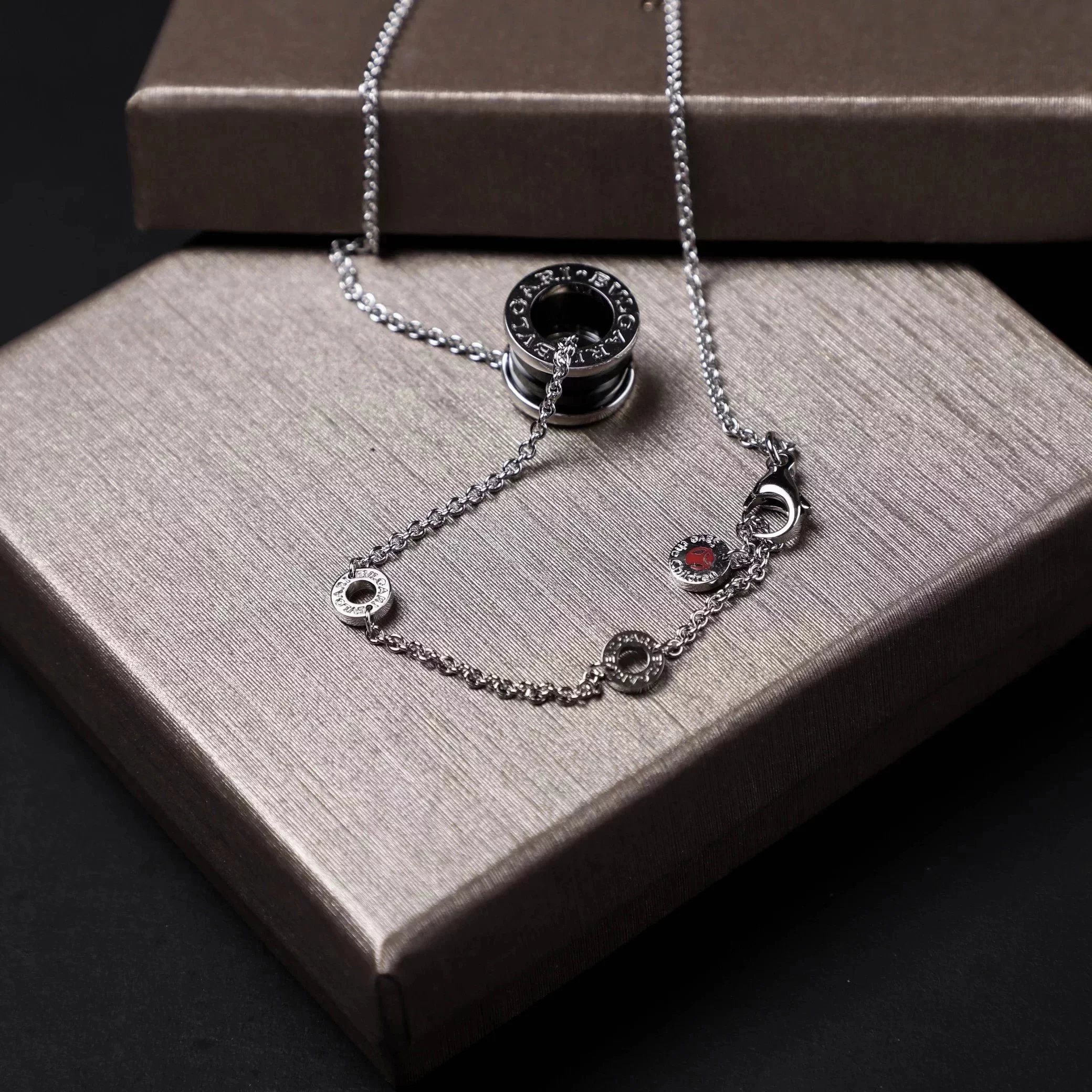 Item ID 8372 Baoge -BGR- Takaraya - Charity Little Red Man Black Ceramic Pendant S9