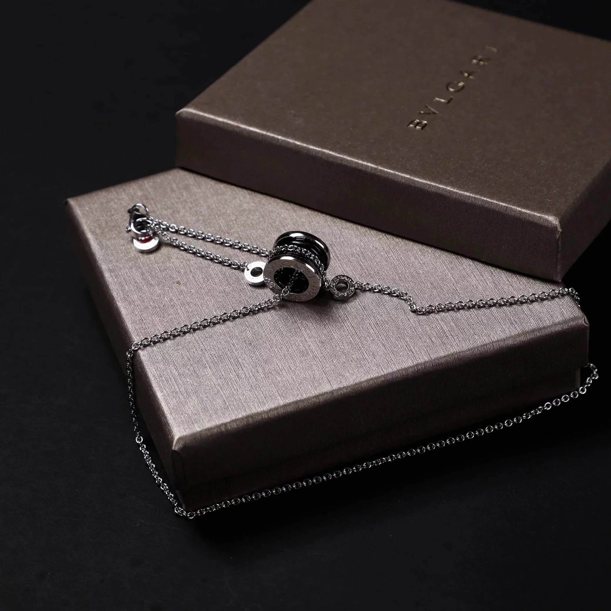 Item ID 8372 Baoge -BGR- Takaraya - Charity Little Red Man Black Ceramic Pendant S9